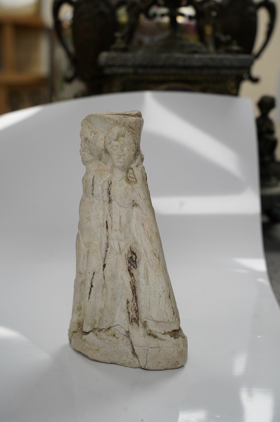 A Devotional bone? figural column, possibly Roman, and depicting 'The Three Graces', 17cm high. Condition - good considering age